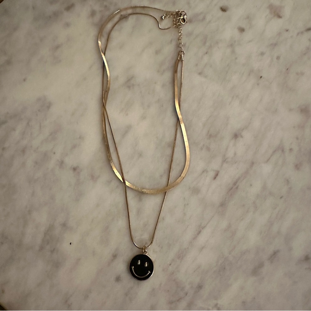 Gold Double-Layer Necklace with Black Smiley Pendant